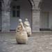  Dublin: Three of a dozen canvas bag people sitting in the courtyard of the Dublin Museum of Fine Art.