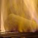  Feuerzangenbowle is a German, erm, technique, for keeping warm on chilly winter nights.  It involves setting a rum-soaked cone of sugar on fire and letting it melt into a pot of warm red wine and oranges.