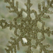  Snowflake decoration hanging in the window.